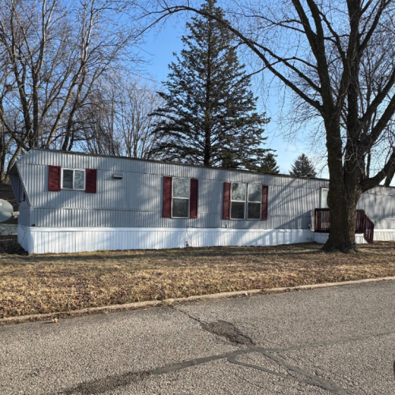 Mobile Home with Shutters