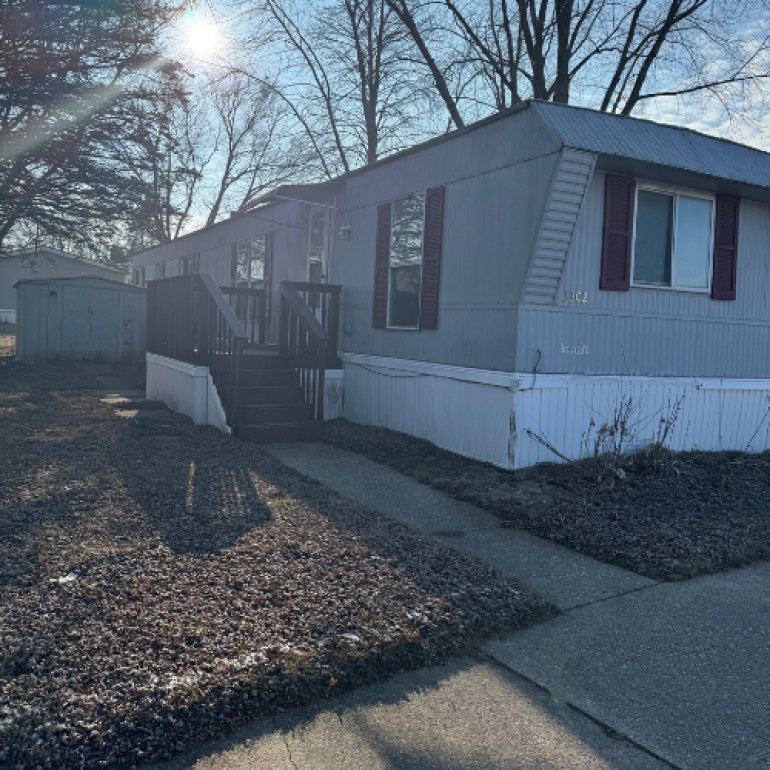 Side of Home with Shed