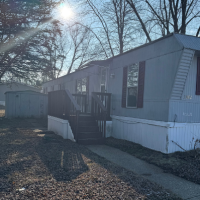 Side of Home with Shed