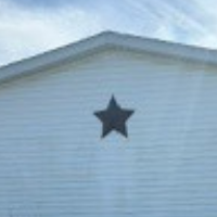 White Mobile Home with Star