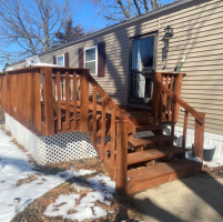 This home has a well built entrance with a good sized deck
